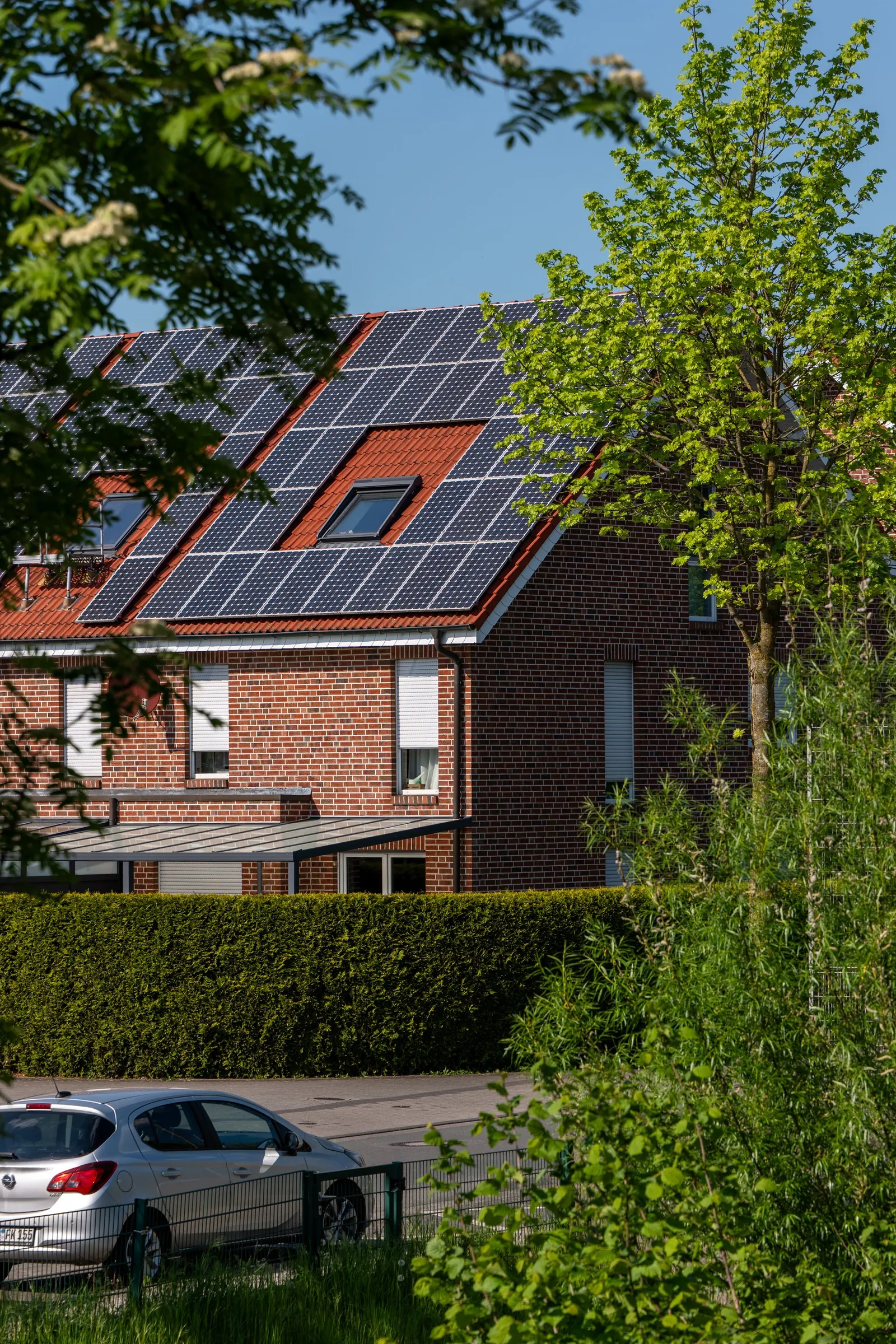 A modern house with solar panels on the roof