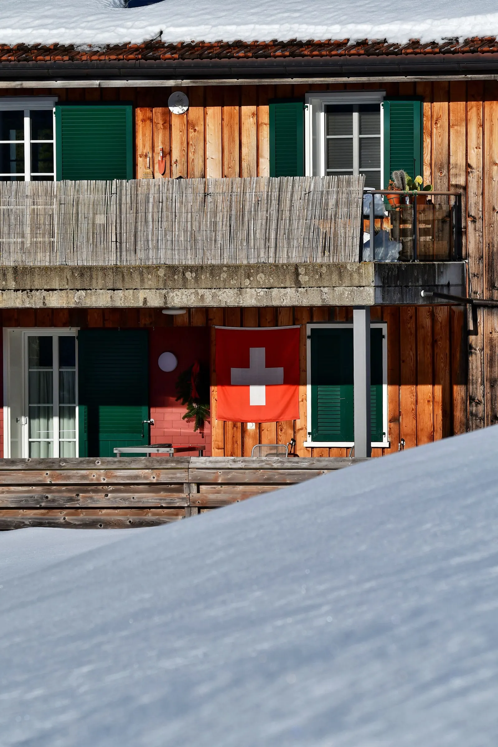 A chalet-style house in deep snow