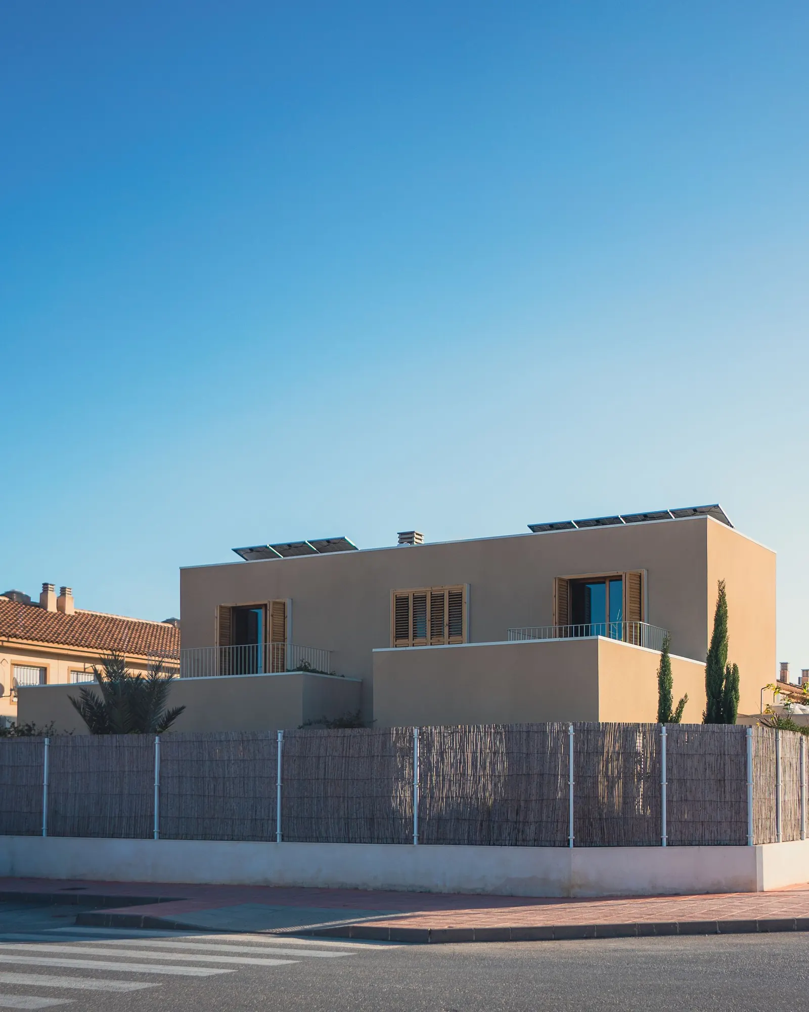 A modern house with solar panels on the roof